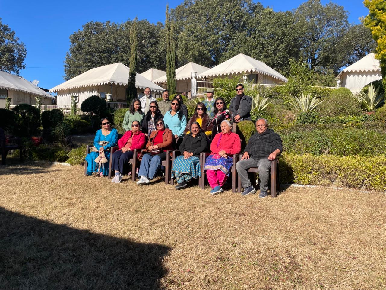 A multigenerational group enjoying a comfortable Himalayan resort stay