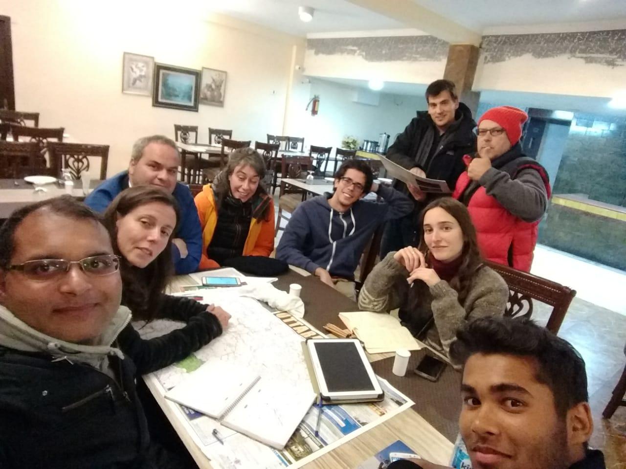 The Himalayan Travel Tribes team planning a journey with field maps