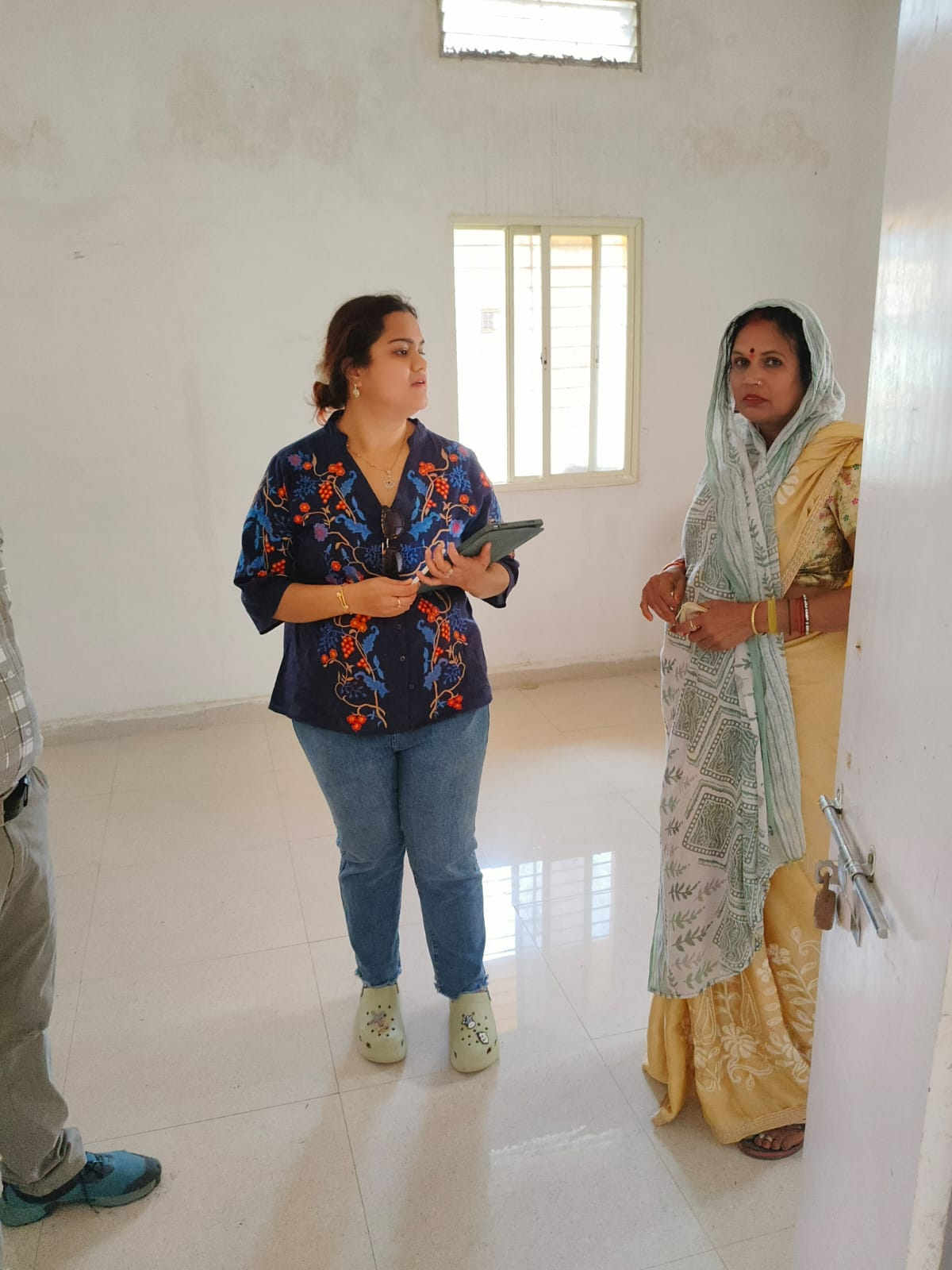 Discussion during the hostel interior site walkthrough