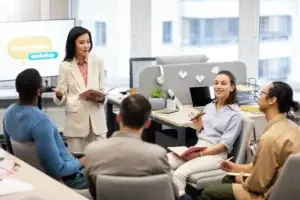 Employees sharing feedback through discussion and surveys to improve hybrid workplace experience.