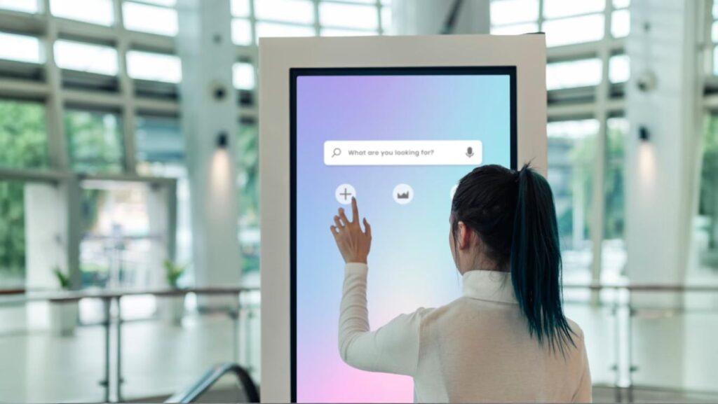Visitor checking in via Kiosk