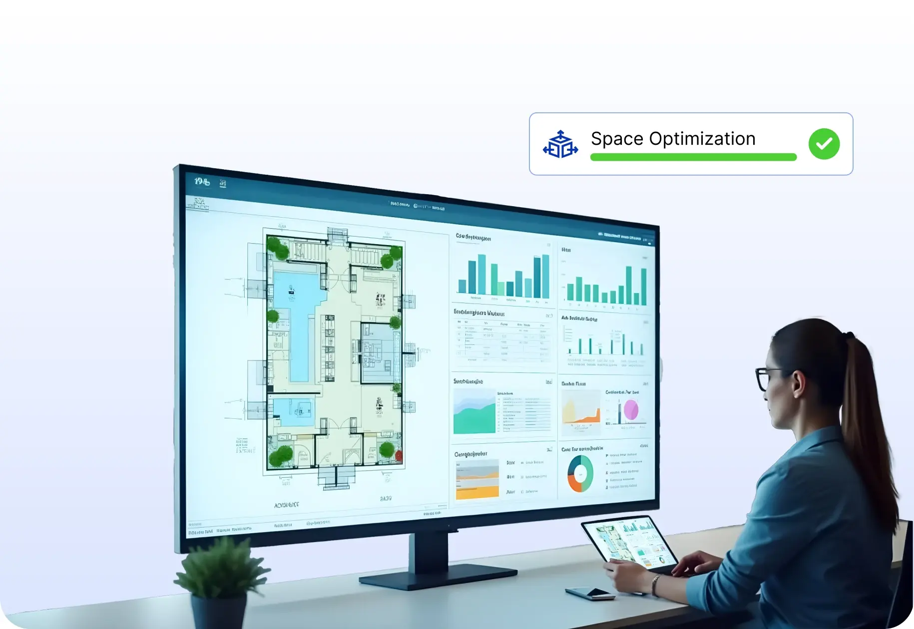 A facilities analyst reading a floor plan and utilization dashboard, with a space optimization progress chip alongside