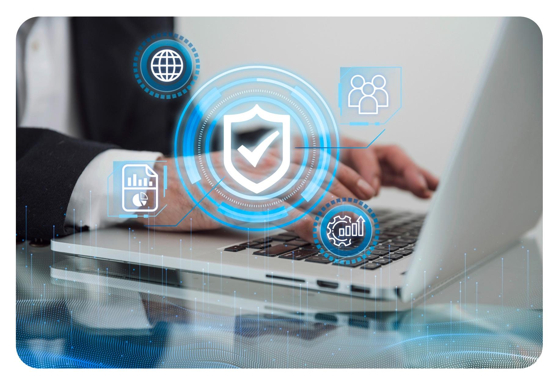 Hands typing on a laptop under a ring of security icons: a shield and tick, a globe, a user group, a report and a settings gear