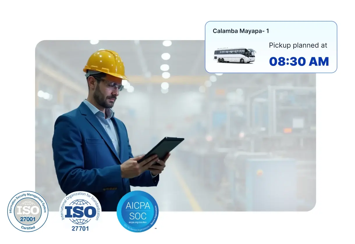 A plant engineer reviewing schedules on a tablet, with ISO 27001, ISO 27701 and SOC 2 seals