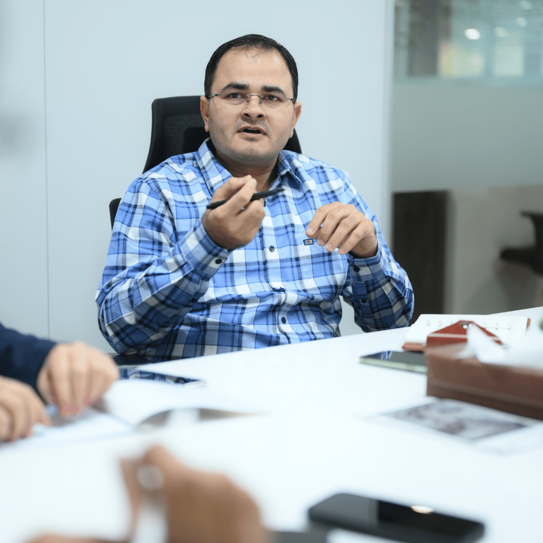 CRS advisor discussing a business decision with a client